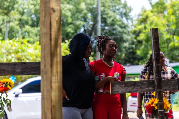 JACKSONVILLE, FL - AUG, 2023: People at a memorial for the vict