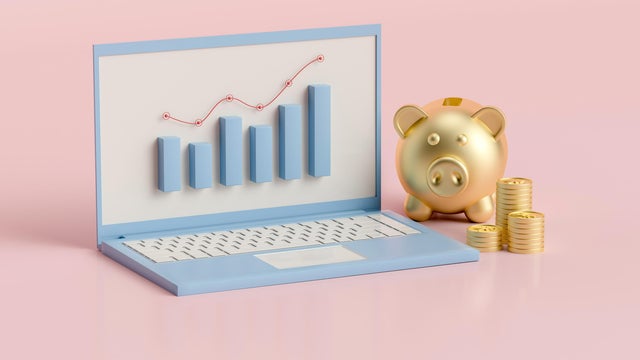 Computer and Rising Economic Trend Chart 