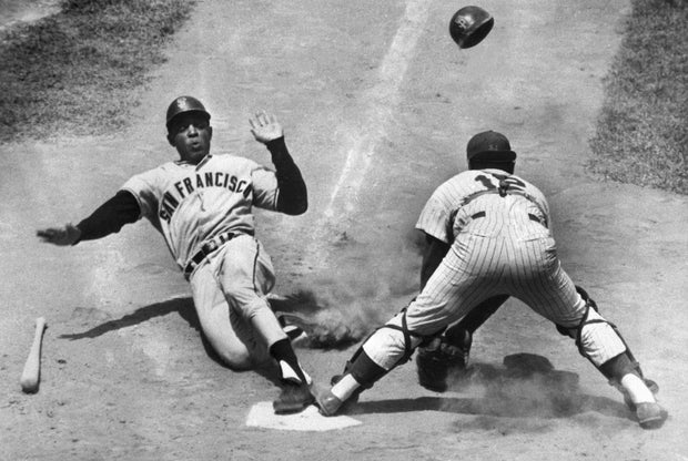 Willie Mays sliding into Home Plate in 1964