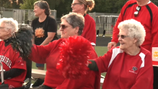 Senior living residents show support for their growing friendship with the Eden Prairie Football team 