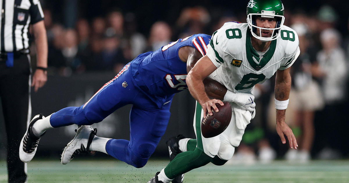 Jets lose Aaron Rodgers to an Achilles tendon injury, then rally to stun  Bills 22-16 in overtime