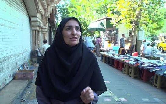 Fatemeh, a medical advisor, speaks with CBS News on a street in Tehran, Iran, in early September 2023