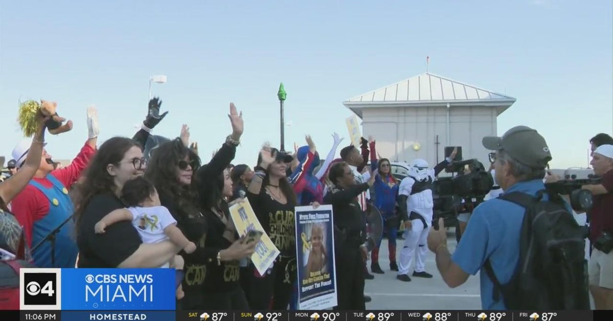 Police, superheroes increase spirits for courageous children battling cancer Police, superheroes increase spirits for courageous children battling cancer