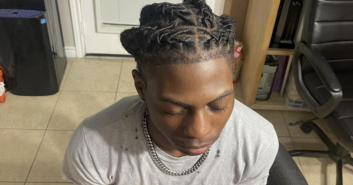A Black student was suspended for his hairstyle. Now, his family is suing Texas officials.