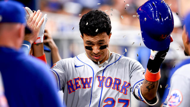 Mark Vientos #27 of the New York Mets celebrates with teammates after hitting a home run against the Miami Marlins during the sixth inning of the game at loanDepot park on September 20, 2023 in Miami, Florida. 