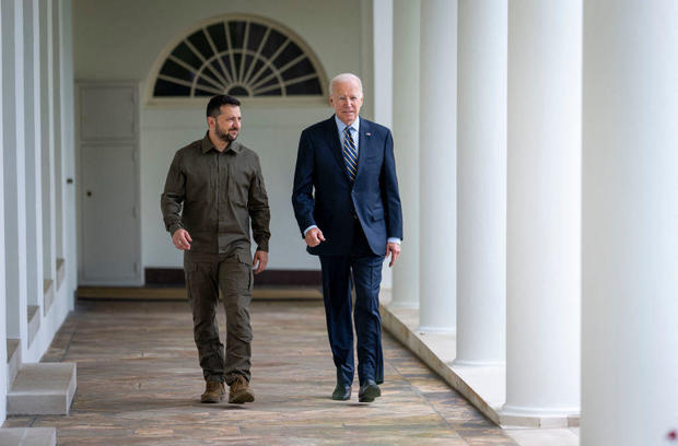 President Biden and Ukrainian President Volodymyr Zelenskyy walk through the colonnade to the Oval Office at the White House in Washington, D.C., on Sept. 21, 2023. 
