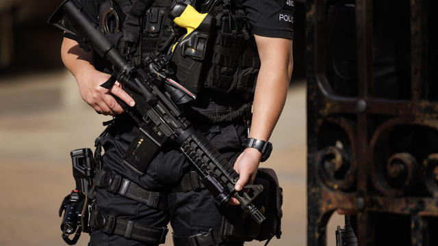 Police Firearms Officers Turn In Their Weapons After Murder Charge 