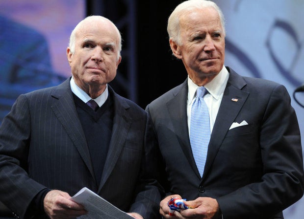 Sen. John McCain receives the the 2017 Liberty Medal from former Vice President Joe Biden at the National Constitution Center on Oct. 16, 2017, in Philadelphia.