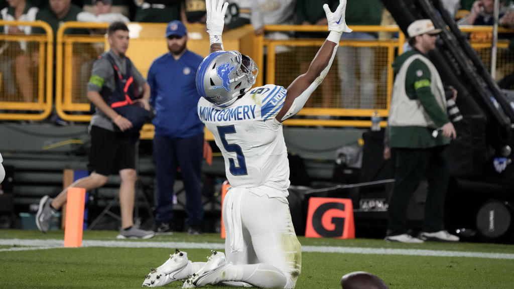 David Montgomery runs wild as Lions beat Packers 34-20 to take early  command of NFC North