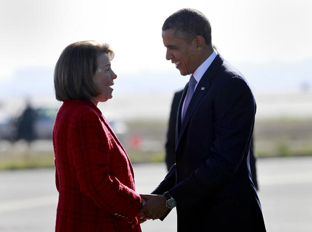 President Obama greeted California Senator Dianne Feinstein after Air Force One landed at SFO Monday November 25, 2013 in San Francisco, Calif. 
