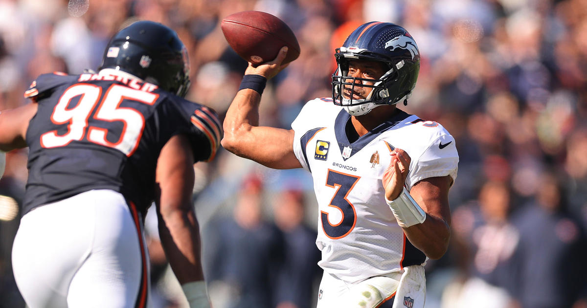 Denver Broncos safety Delarrin Turner-Yell walks on the sideline