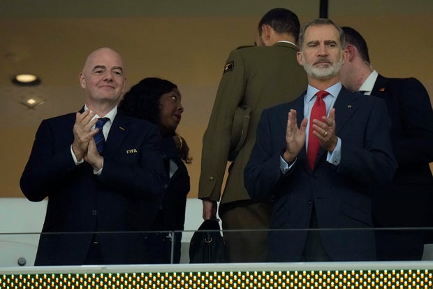 King Felipe VI of Spain, right, and FIFA President Gianni Infantino applaud before the World Cup soccer match between Spain and Costa Rica at the Al Thumama Stadium in Doha, Qatar, Wednesday, Nov. 23, 2022