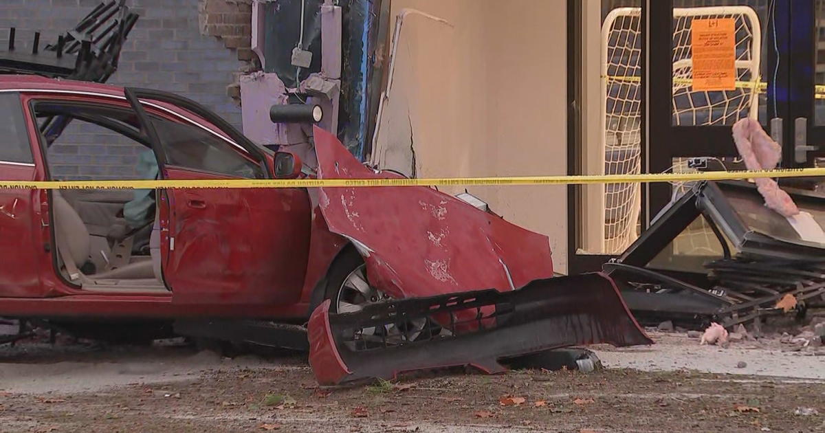 This Photo Of A Car Crashed Perfectly Into A Driving School Under
