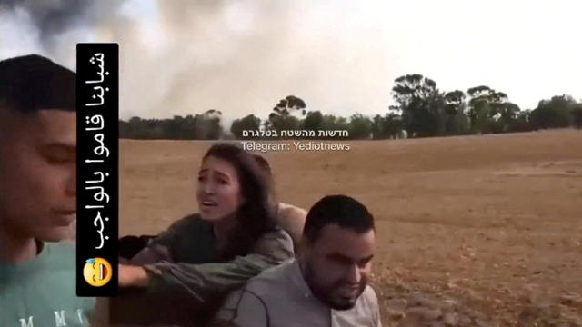 A screengrab from a social media video published on October 7, 2023 shows Noa Argamani as she is taken hostage by Palestinian militants 