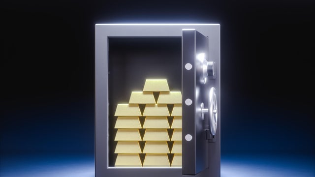 3D illustration. An open safe deposit box with a stack of gold bars inside. 