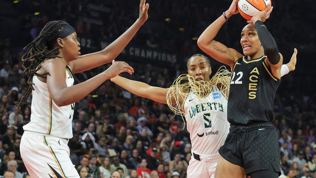 A'ja Wilson #22 of the Las Vegas Aces is defended by Jonquel Jones #35 and Kayla Thornton #5 of the New York Liberty in the first quarter of Game Two of the 2023 WNBA Playoffs finals at Michelob ULTRA Arena on October 11, 2023 in Las Vegas, Nevada. 