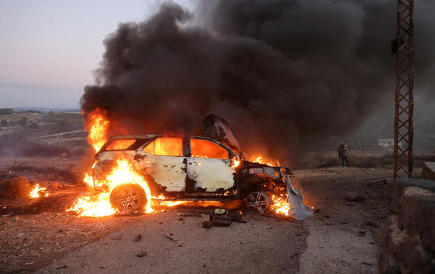 A journalist's car burns in Alma Al-Shaab, southern Lebanon 