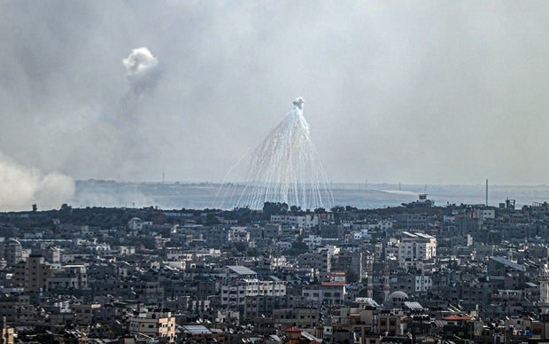 Smoke is seen over Gaza City amid claims by Palestinian officials and human rights organizations that Israel has used white phosphorus incendiary bombs in its attacks on populated areas in Gaza, Oct. 11, 2023