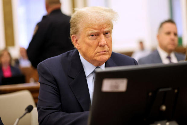Former President Donald Trump sits in the courtroom during his civil fraud trial at New York State Supreme Court on Oct. 18, 2023 in New York City. 