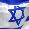 Close-up view of the Israel national flag waving in the wind 