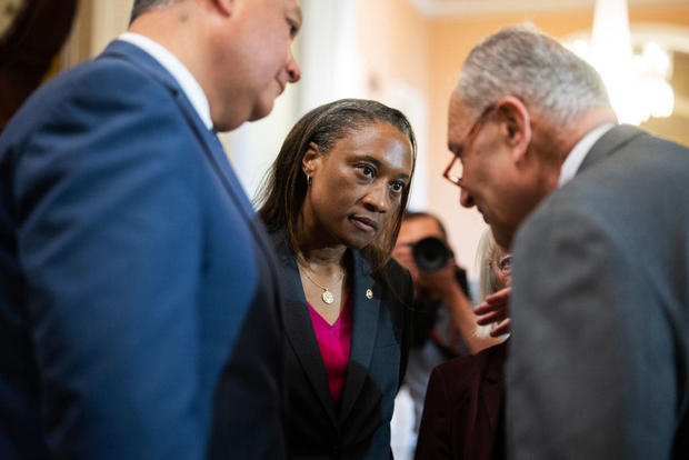 Sen. Laphonza Butler, D-Calif., Majority Leader Charles Schumer and Sen. Alex Padilla prepare for a news conference at the Capitol on Wednesday, Oct. 4, 2023. 