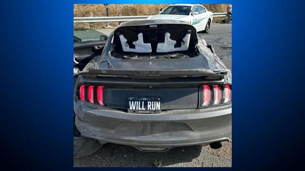 Damaged Ford Mustang after CHP pursuit and crash 