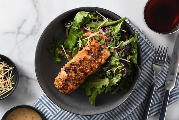 Plated Almond-Crusted Salmon with roasted sesame salad 