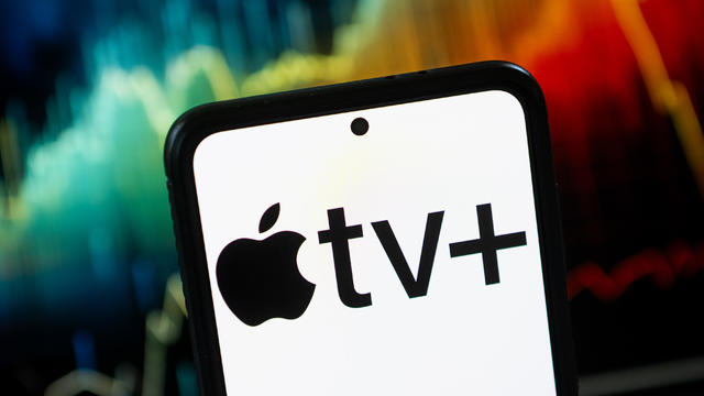 In this photo illustration a Apple TV+ logo seen displayed 