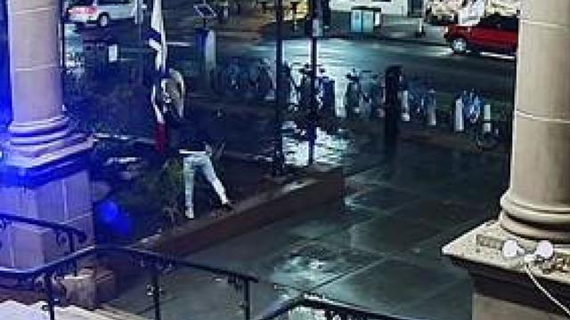 Surveillance footage appears to show someone removing an Israeli flag flying outside Hoboken City Hall. 