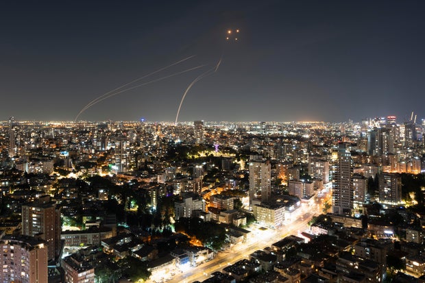 Israel's Iron Dome air defense system fires to intercept a rocket fired from the Gaza Strip in central Israel on Oct. 30, 2023