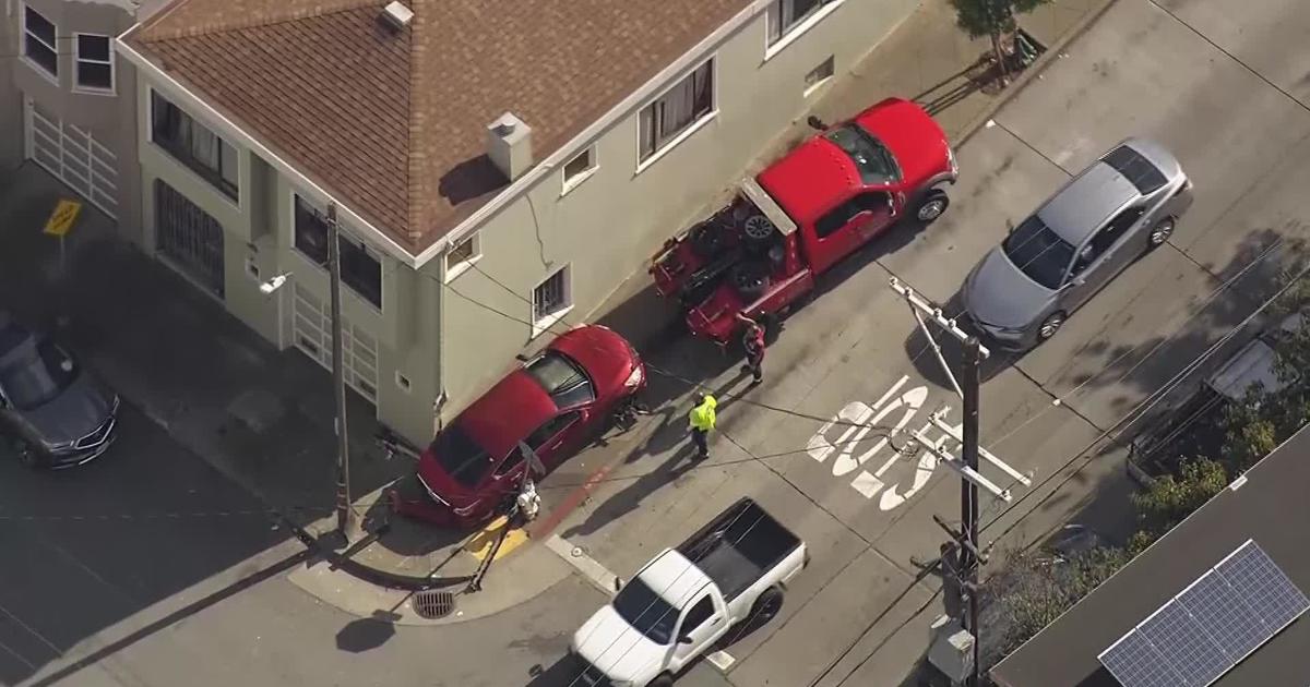 Raw video: Scene above car vs. home collision in San Francisco