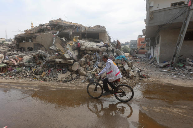 Gaza doctor travels on his bicycle to help displaced patients amid fuel shortages 