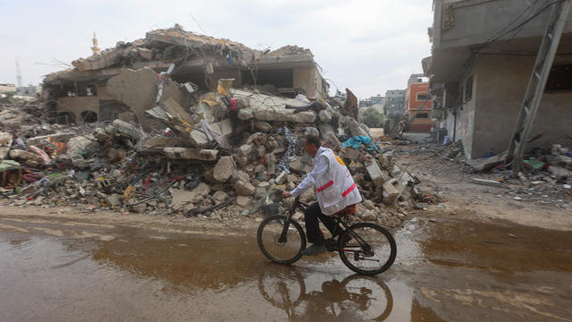Gaza doctor travels on his bicycle to help displaced patients amid fuel shortages 