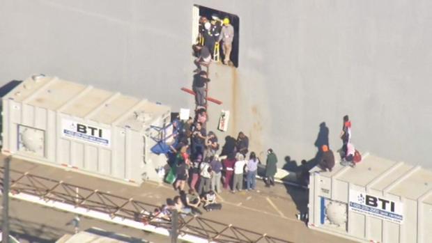 Protesters attach themselves to the military supply ship Cape Orlando at the Port of Oakland, November 3, 2023. Credits: KPIX