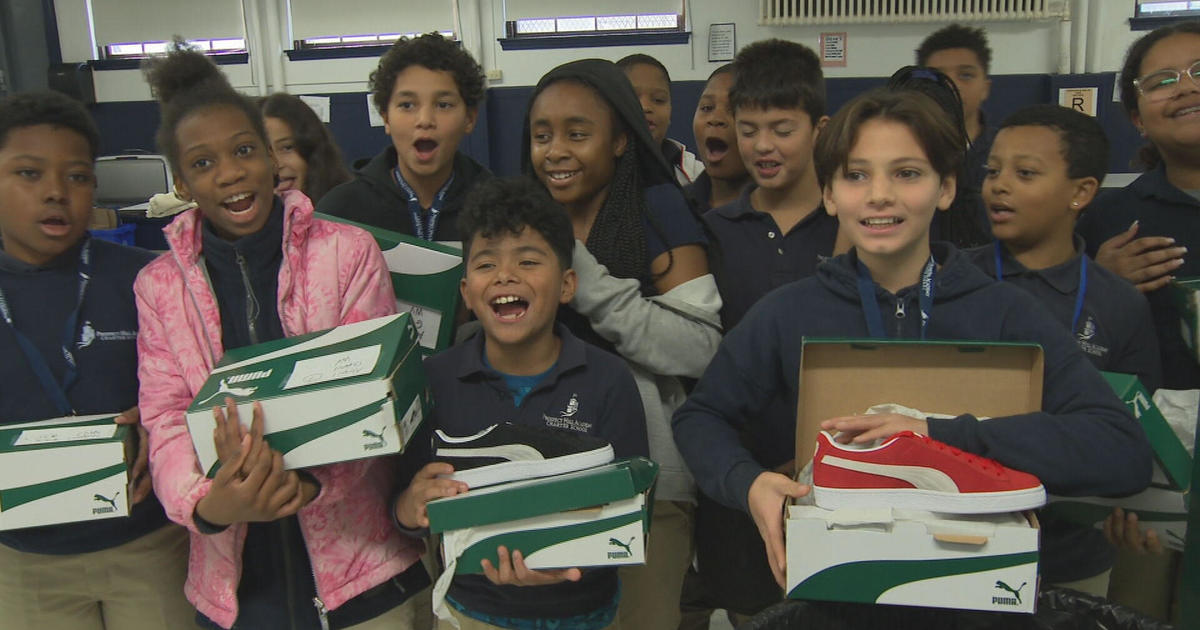 Students and staff at Prospect Hill Academy in Somerville gifted new sneakers from school mentor