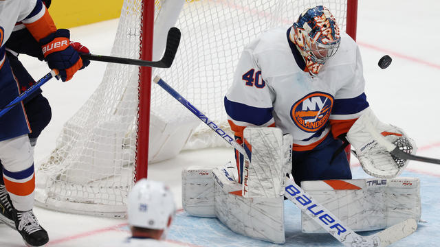 Ryan Pulock #6 of the New York Islanders skates past Connor McMichael #24 of the Washington Capitals during the third period at Capital One Arena on November 02, 2023 in Washington, DC. 