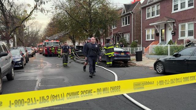 Crime scene tape blocks off a street in the Bronx. 