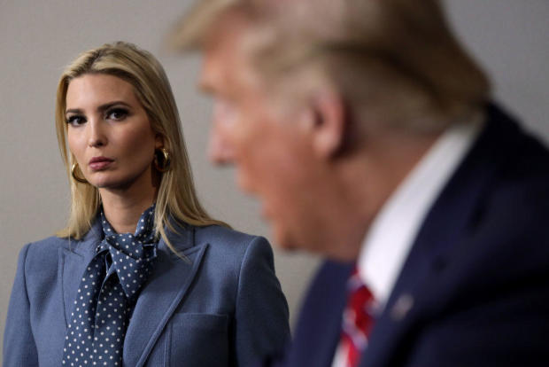 President Donald Trump speaks as his daughter and senior adviser Ivanka Trump looks on during a news briefing at the White House on March 20, 2020. 