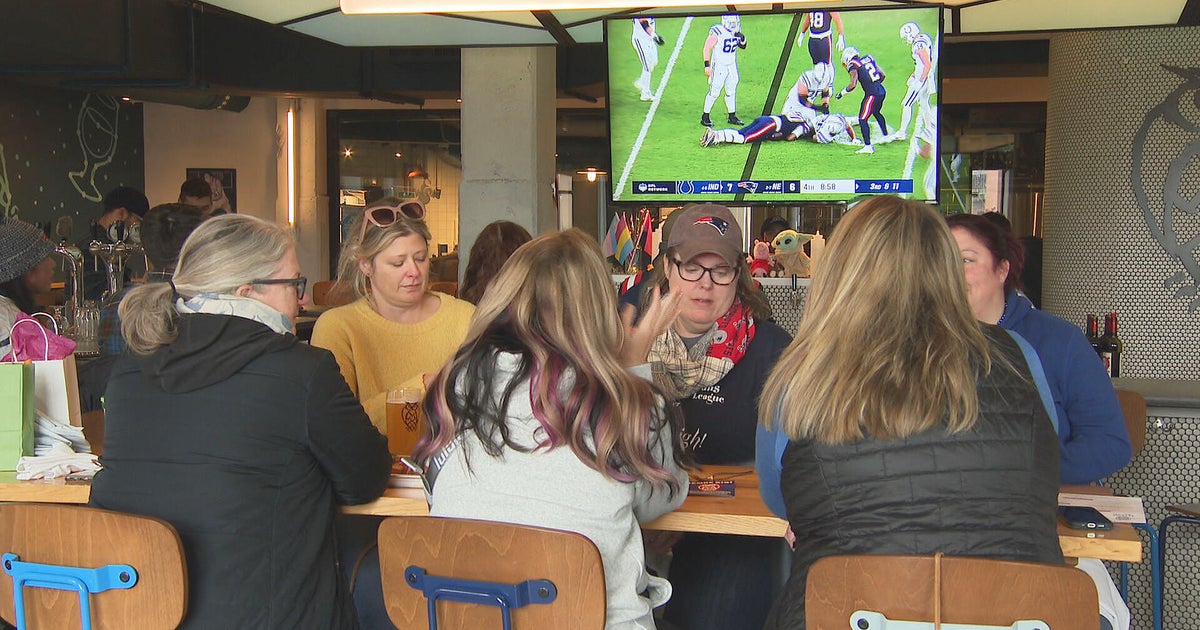 Patriots fans up early for Germany game, but still down after another
