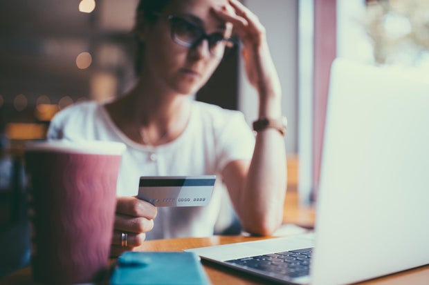 Woman using computer for online banking
