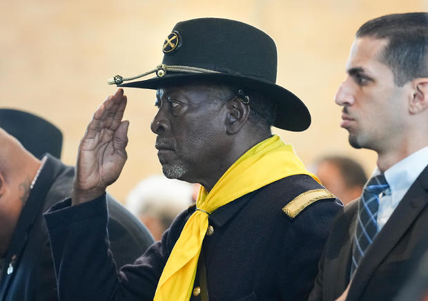 A Buffalo Soldier salutes during an event recognizing the legacy of the soldiers from the 3rd Battalion, 24th Infantry Regiment, at Buffalo Soldiers Museum on Monday, Nov. 13, 2023, in Houston, Texas. 
