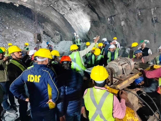 Members of rescue teams prepare to conduct a rescue operation after a portion of an under-construction tunnel collapsed in Uttarkashi