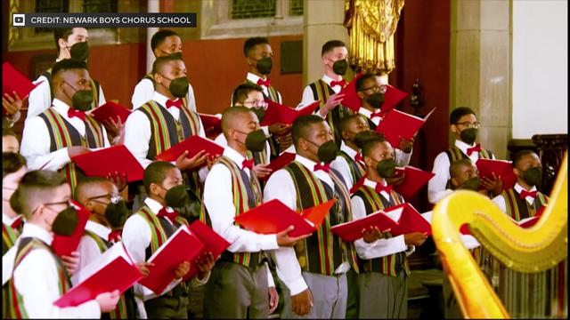 Students with the Newark Boys Chorus School perform in a church. 