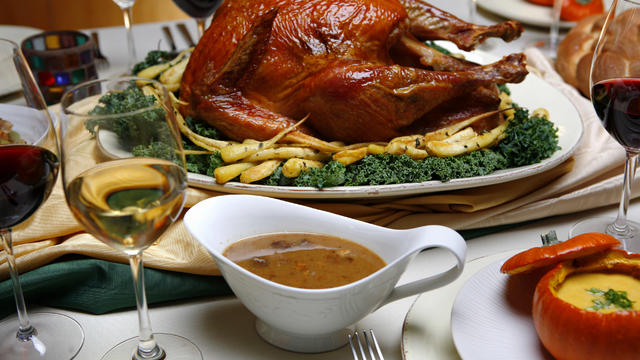 Salt–rubbed, roasted turkey with roasted parsnips, pan sauce, center and spiced pumpkin soup with m 