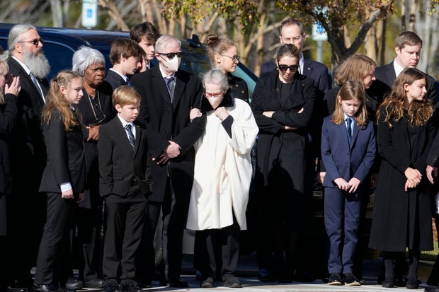Carter family members gather before the departure ceremony with the casket of former first lady Rosalynn Carter at Phoebe Sumter Medical Center in Americus, Ga., Monday, Nov. 27, 2023.