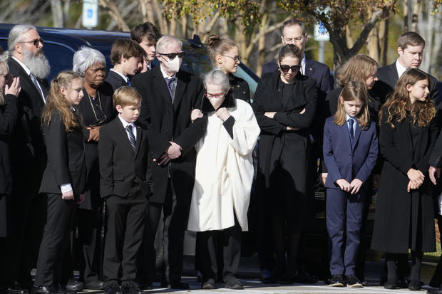 Carter family members gather before the departure ceremony with the casket of former first lady Rosalynn Carter at Phoebe Sumter Medical Center in Americus, Ga., Monday, Nov. 27, 2023. 