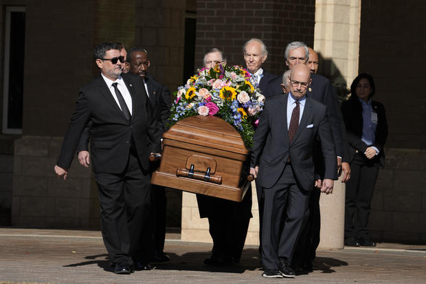 Former and current U.S. Secret Service agents assigned to the Carter detail, carry casket of former first lady Rosalynn Carter at Phoebe Sumter Medical Center in Americus, Georgia, on Monday, Nov. 27, 2023. 