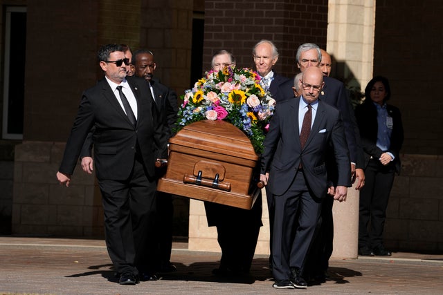 Former and current U.S. Secret Service agents assigned to the Carter detail, carry casket of former first lady Rosalynn Carter at Phoebe Sumter Medical Center in Americus, Georgia, on Monday, Nov. 27, 2023. 