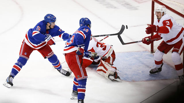 New York Rangers Left Wing Jimmy Vesey (26) swats in a go ahead goal during the third period of the National Hockey League game between the Detroit Red Wings and the New York Rangers on November 29, 2023 at Madison Square Garden in New York, NY. 