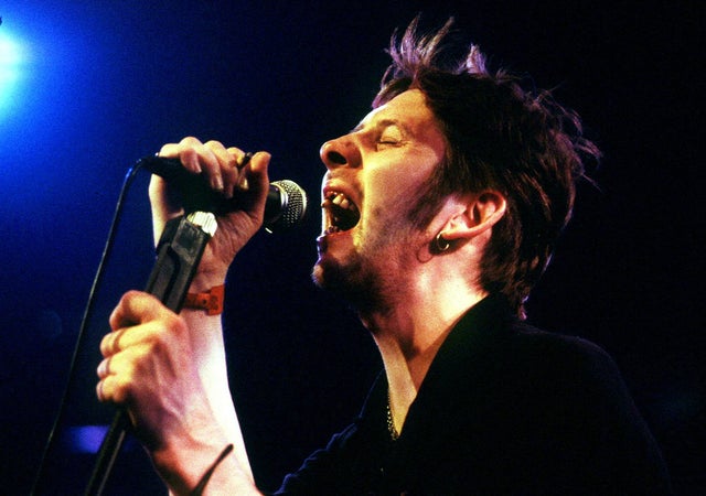 FILE PHOTO: Shane MacGowan, former lead singer of The Pogues, performs during the Montreux Jazz festival. 